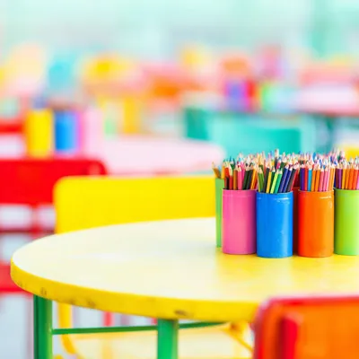 Young students smiling in a classroom